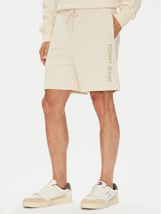 Tommy Jeans Szorty sportowe New Classic Beach DM0DM21781 Beżowy Relaxed Fit