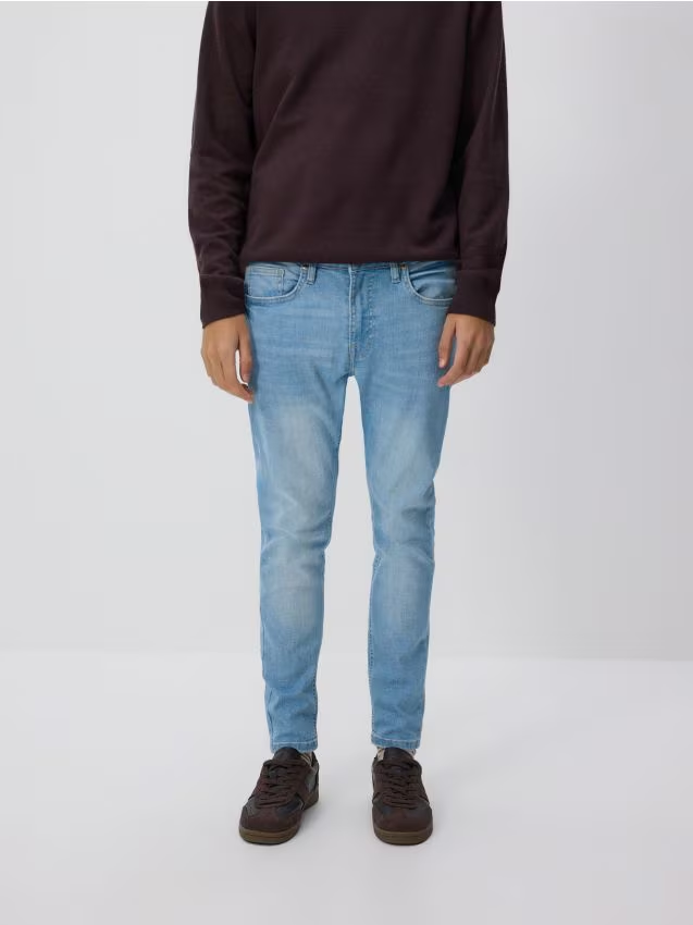 Reserved - Jeansy skinny z efektem sprania - niebieski