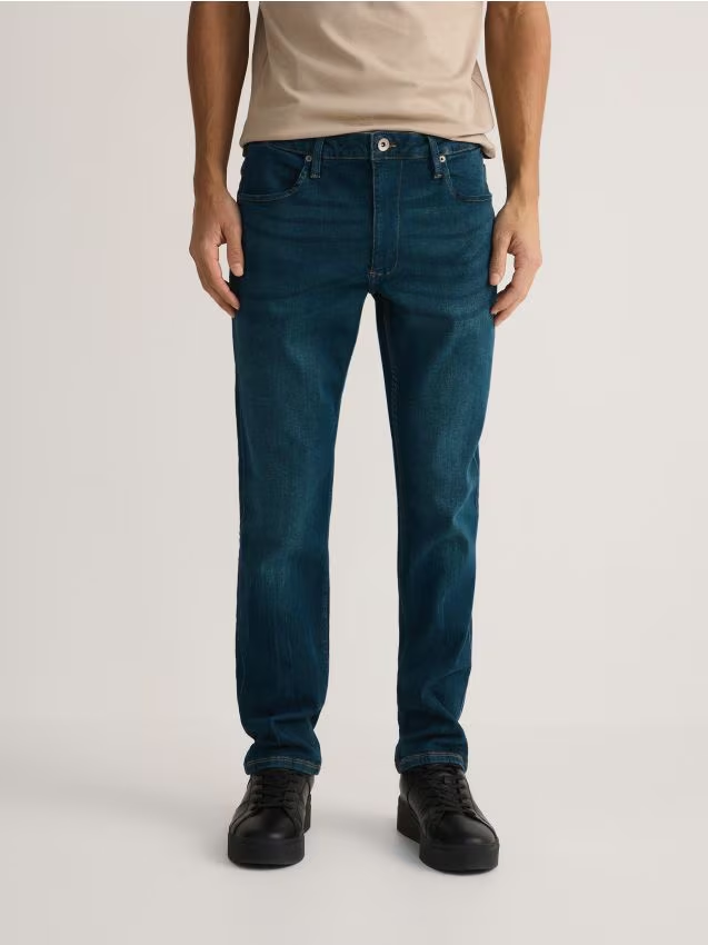 Reserved - Jeansy slim z efektem sprania - indigo jeans