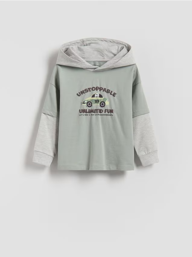 Reserved - Bawełniany longsleeve z kapturem - jasnozielony