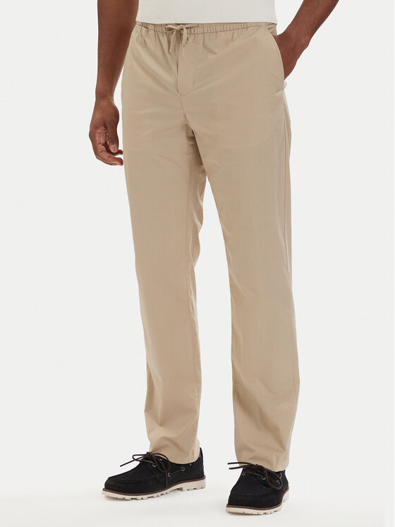 Tommy Hilfiger Chinosy Denton MW0MW42340 Beżowy jasny Slim Fit