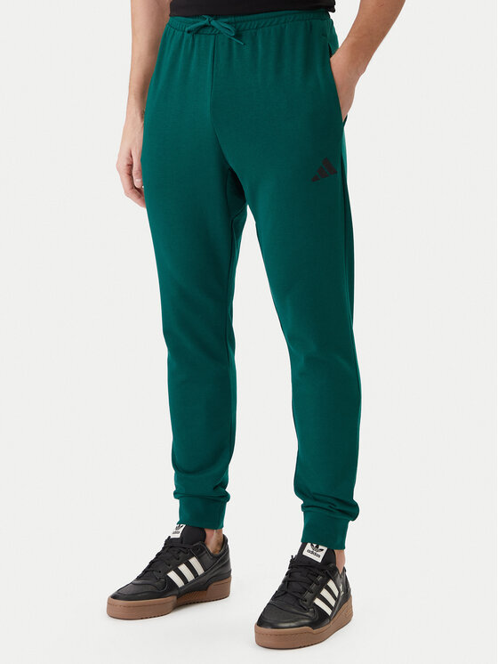 adidas Spodnie dresowe Essentials Feel Cozy JE3858 Zielony Regular Fit