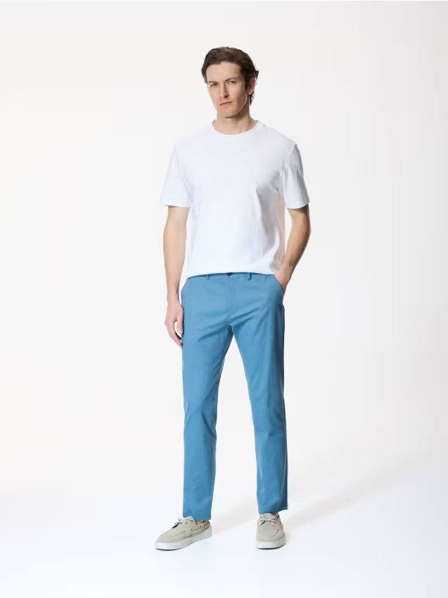 Reserved - Spodnie chino slim fit - granatowy