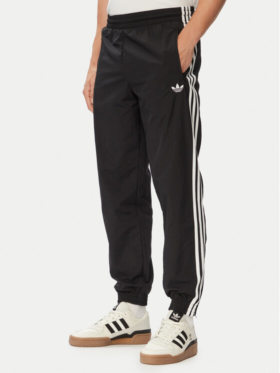 adidas Spodnie dresowe Firebird Woven KE1371 Czarny Regular Fit