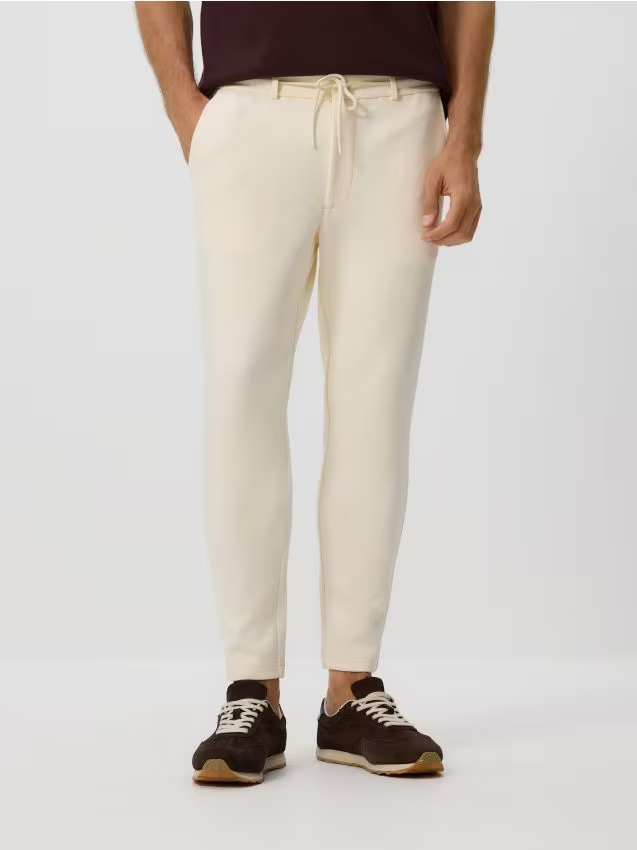 Reserved - Spodnie chino slim fit - złamana biel miniaturka