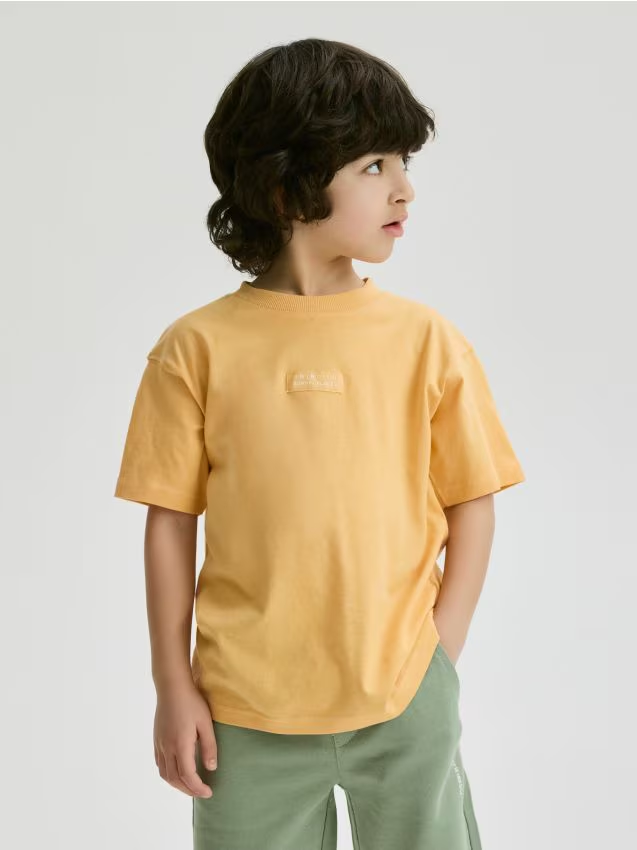 Reserved - Bawełniany t-shirt - jasnopomarańczowy miniaturka