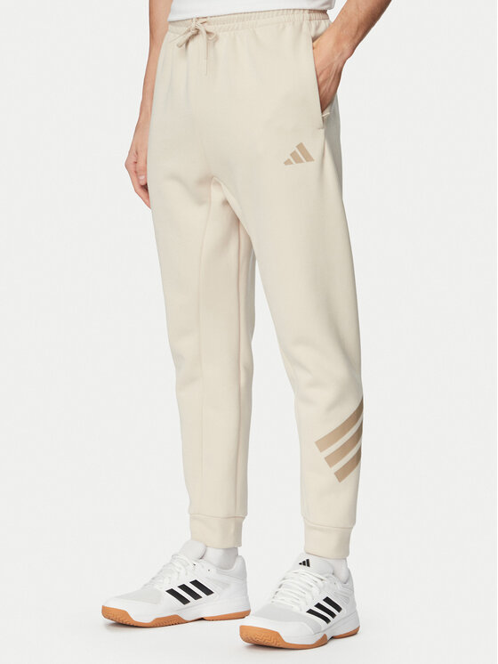 adidas Spodnie dresowe Future Icons 3-Stripes KD5206 Beżowy Regular Fit