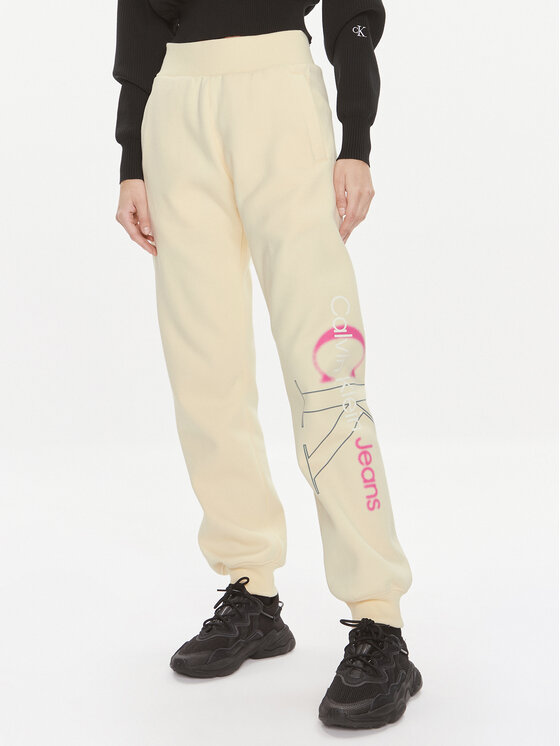 Calvin Klein Jeans Spodnie dresowe Bold Monologo J20J222606 Żółty Relaxed Fit