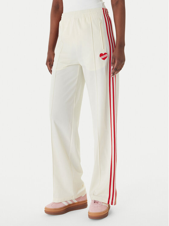 adidas Spodnie dresowe Firebird KQ8056 Beżowy Loose Fit