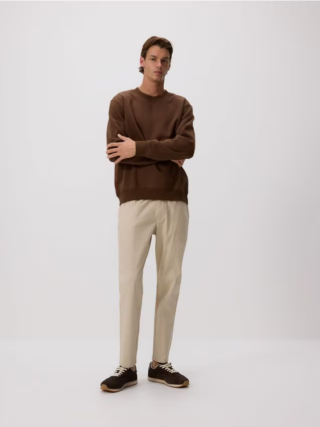 Reserved - Spodnie jogger slim - złamana biel