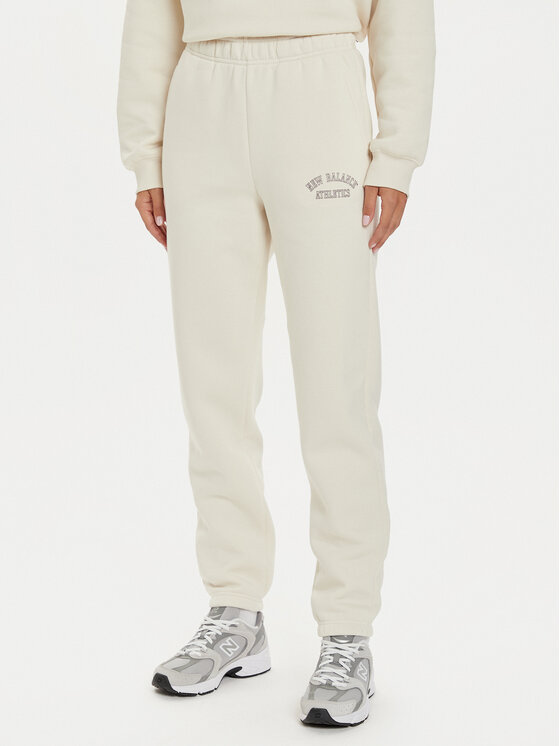 New Balance Spodnie dresowe WP43500 Beżowy Relaxed Fit