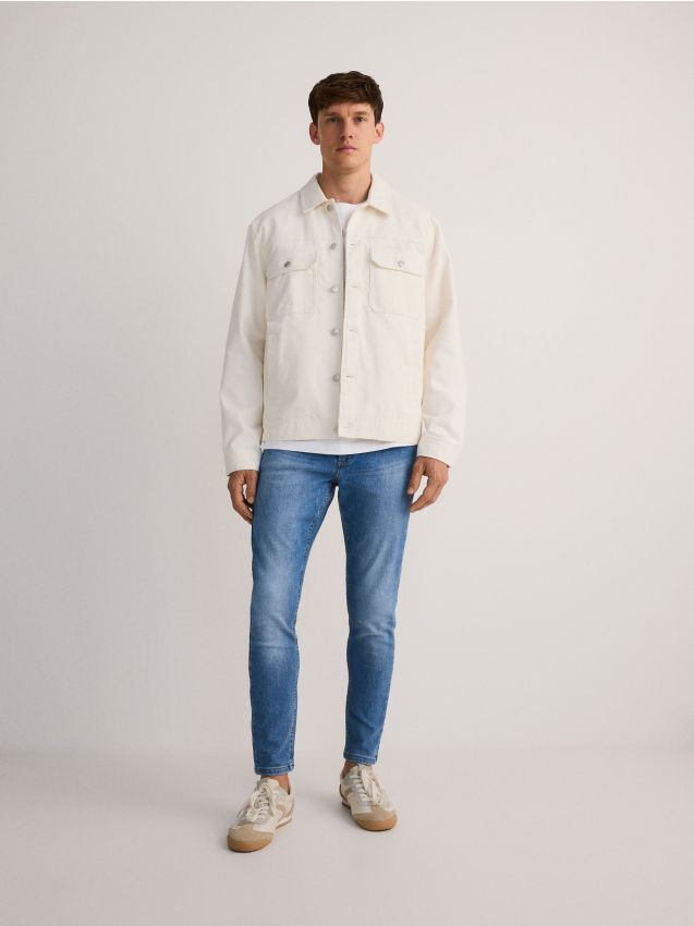 Reserved - Jeansy skinny z efektem sprania - niebieski