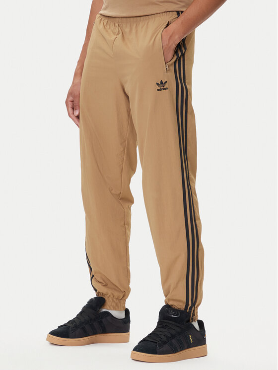adidas Spodnie dresowe adicolor Woven Firebird JY1339 Beżowy Regular Fit