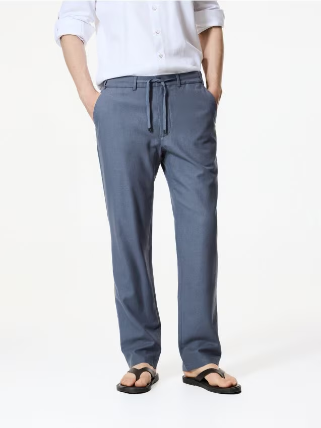 Reserved - Spodnie chino regular fit - granatowy