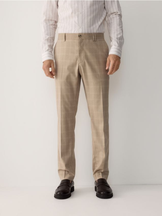 Reserved - Spodnie garniturowe slim fit - beżowy